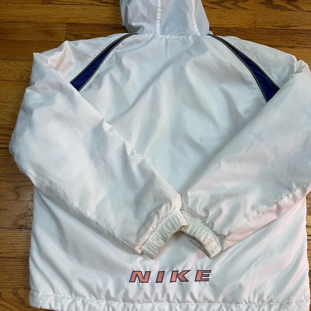 Woman’s size medium, white Nike jacket (lined)